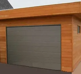 Création d'un garage en ossature bois de style moderne par Vision Bois Métal à Lucats